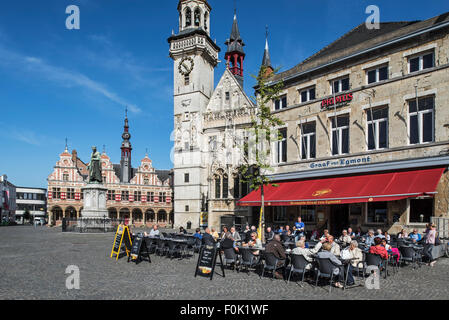 Belfry and tourists at outdoor café on the town square in Aalst / Alost, East Flanders, Belgium Stock Photo