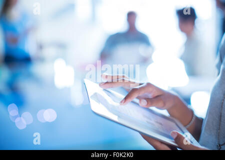 Close up businesswoman using digital tablet Stock Photo