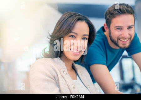 Portrait confident businessman and businesswoman Stock Photo