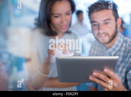 Creative business people using digital tablet in office Stock Photo
