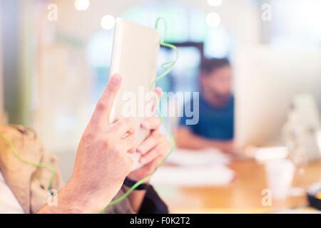 Close up creative businessman using digital tablet Stock Photo