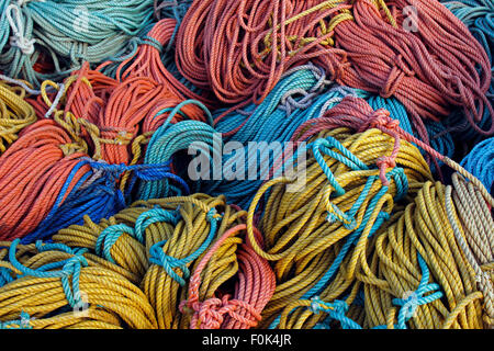 Lobster lines in bundles on dock Vinalhaven Island Maine New England USA Stock Photo
