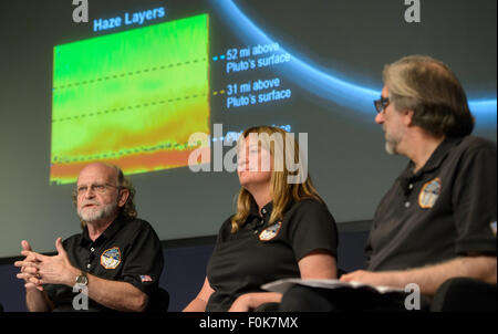 Michael Summers, New Horizons co-investigator at George Mason University in Fairfax, Virginia, left, is seen during a New Horizons science update where new images and the latest science results from the spacecraft's historic July 14 flight through the Pluto System were discussed, Friday, July 24, 2015 at NASA Headquarters in Washington. Stock Photo