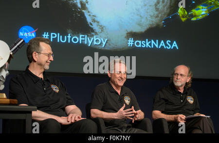 Jim Green, director of Planetary Science at NASA Headquarters in Washington, right, Alan Stern, New Horizons principal investigator at Southwest Research Institute (SwRI) in Boulder, Colorado, center, and Michael Summers, New Horizons co-investigator at George Mason University in Fairfax, Virginia, left, are seen during a New Horizons science update where new images and the latest science results from the spacecraft's historic July 14 flight through the Pluto System were discussed, Friday, July 24, 2015 at NASA Headquarters in Washington. Stock Photo