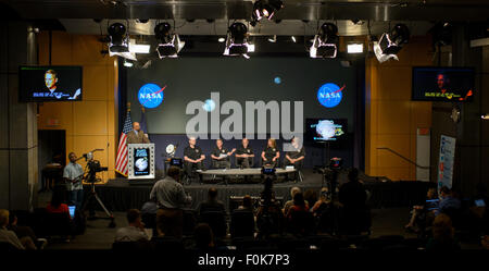 NASA Senior Public Affairs Officer Dwayne Brown, left,  moderates a New Horizons science update with participants, from left, Jim Green, director of Planetary Science at NASA Headquarters in Washington, Alan Stern, New Horizons principal investigator at Southwest Research Institute (SwRI) in Boulder, Colorado, Michael Summers, New Horizons co-investigator at George Mason University in Fairfax, Virginia, Cathy Olkin, New Horizons deputy project scientist at SwRI, and William McKinnon, New Horizons co-investigator at Washington University in St. Louis on Friday, July 24, 2015 at NASA Headquarter Stock Photo