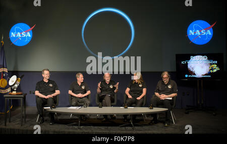 Michael Summers, New Horizons co-investigator at George Mason University in Fairfax, Virginia, center, is seen during a New Horizons science update where new images and the latest science results from the spacecraft's historic July 14 flight through the Pluto System were discussed, Friday, July 24, 2015 at NASA Headquarters in Washington.  Participants in the science update included: Jim Green, director of Planetary Science at NASA Headquarters in Washington, far left, Alan Stern, New Horizons principal investigator at Southwest Research Institute (SwRI) in Boulder, Colorado, second from left, Stock Photo