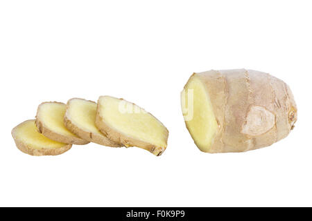 Close-up of piece and slices of fresh ginger root, isolated on white background. Stock Photo