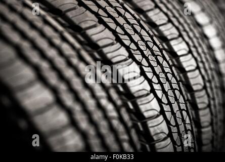 Brand New Tires For Sale. Car Tires Row on a Rack. Stock Photo