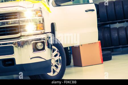 Tire Replacing Service. Pickup Truck in the Tire Service. Stock Photo