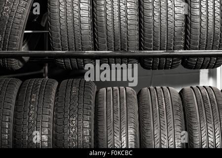 Large Metal Tires Rack. Modern Car Tire Service and Sale. Stock Photo
