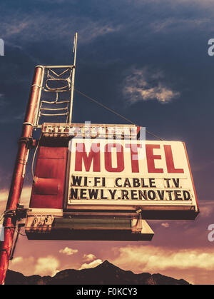 Retro Vintage Image Of Old Motel Sign In Small Town USA In The Mountains Stock Photo