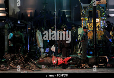 Bangkok, Thailand. 17th Aug, 2015. Police examine the motorbike at the centre of the Bangkok explosion. The bomb in Bangkok has resulted in multiple deaths and injuries. Credit:  Shaukat Ahmed/Pacific Press/Alamy Live News Stock Photo