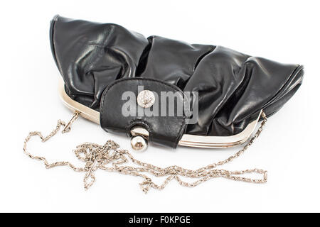 Black purse of artificial leather, isolated on white. Stock Photo