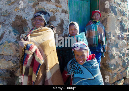 A Basotho family gathers at the center of their village to help oversee local affairs. Stock Photo