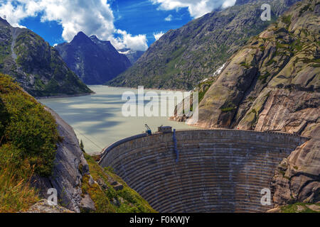 Great view from the top of the Grimsel pass over the Grimselsee dam. Switzerland, Bernese Alps, Europe. Stock Photo