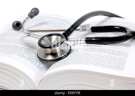 Macro shot of a stethoscope on a medicine book Stock Photo