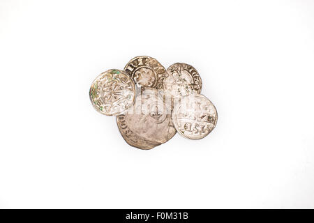 A lot of old silver coins  on a white background Stock Photo