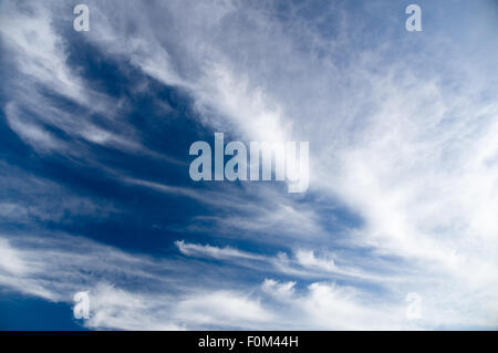 Wide view of blue sky with spreading cirrus clouds Stock Photo