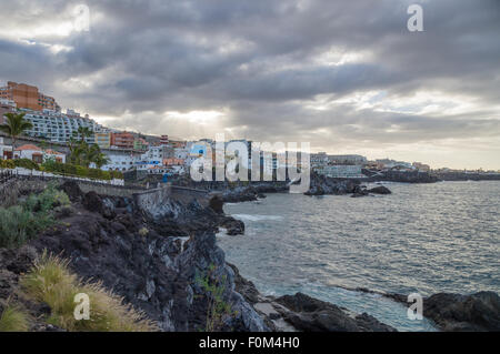 Cloudy weather in coastal resort town Puerto de Santiago, Tenerife, Canary Islands, Spain Stock Photo