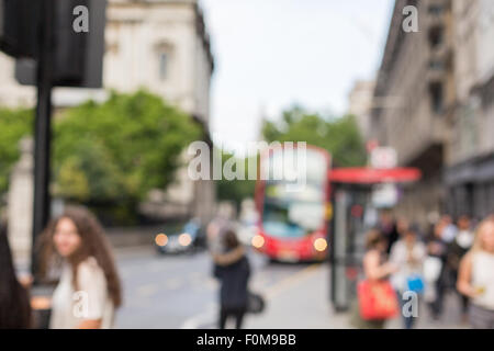 city street with people and transport in london Stock Photo