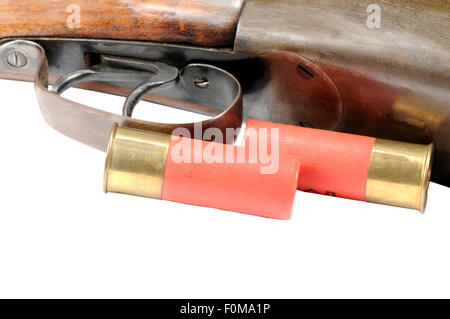 Macro shot of a shotgun and shells isolated on white Stock Photo