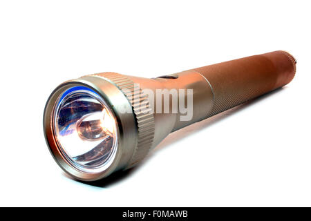 Metal flashlight isolated on a white background Stock Photo