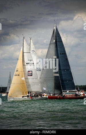 Pictured at the start of the Fastnet race 2015 at Cowes is Kestrel, Volunteer and Anahita, Class 2 yachts Stock Photo
