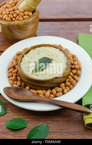 Peanut chutney made by grinding the peanuts and adding sauted mustard and curry leaves Stock Photo