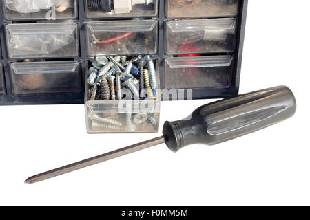 Screwdriver and screws in a tool cabinet isolated on white Stock Photo