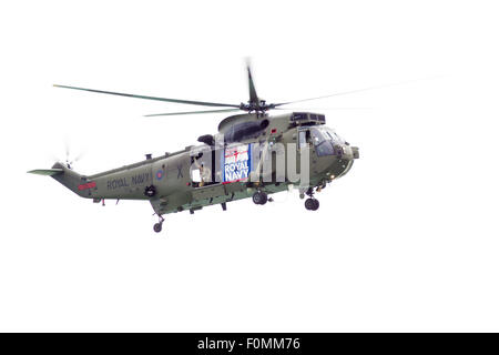 Royal Navy Sea King helicopter flying at Eastbourne Airbourne, UK Stock Photo