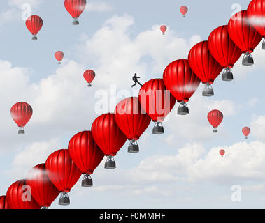 Business management success leadership concept as a group of red air balloons stacked in a staircase or stairs formation so a businessman leader can climb steps towards a financial or career goal as a creative support metaphor. Stock Photo