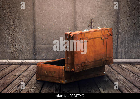 Backside of Open Vintage Leather Suitcase Ready For Packing, Retro Toned Effect Stock Photo