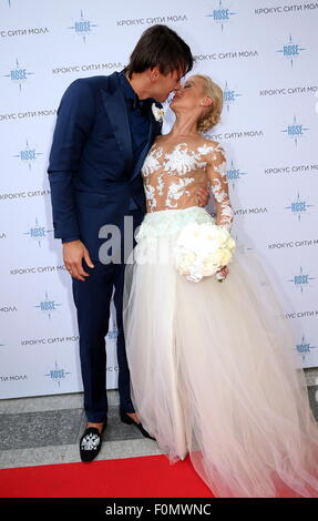 Moscow, Russia. 18th Aug, 2015. Two-time Olympic figure skating champions Maxim Trankov (L) and Tatiana Volosozhar during their wedding at the Rose Bar restaurant. Credit:  Vyacheslav Prokofyev/TASS/Alamy Live News