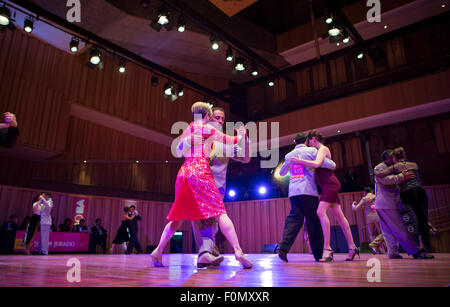 Couples compete in the salon category at the World Tango Championship ...