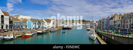 Horizontal panoramic (3 picture stitch) view of Weymouth, Dorset. Stock Photo