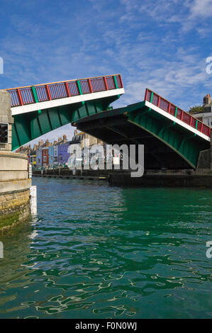 Vertical view of Town Bridge being raised in Weymouth, Dorset. Stock Photo
