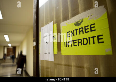 Office interior and sign on the door saying: do not enter at the high court of Brussels. Stock Photo