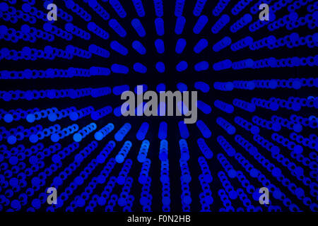Abstract background composed of small blue circles on black. Stock Photo