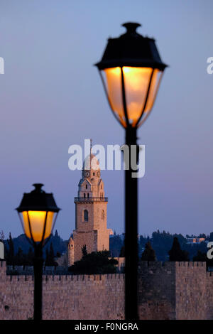 View at twilight of bell tower of the Church of the Benedictine Abbey of the Dormition on top of mount Zion in Jerusalem Israel Stock Photo