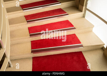 Red carpet on spiral staircase in the Midland Hotel Morecambe; Hotel; Stock Photo