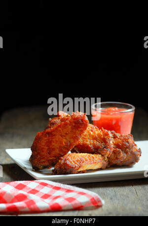 Fried Chicken Wings on wood  background Stock Photo