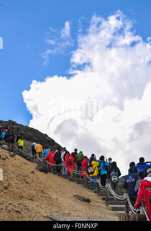 Changbai Mountain, China's Jilin Province. 17th Aug, 2015. Visitors go sightseeing on the Changbai Mountian, northeast China's Jilin Province, Aug. 17, 2015. The Changbai Mountain attracted 1.93 million tourists in 2014, up 23 percent year on year. Credit:  Xu Chang/Xinhua/Alamy Live News Stock Photo