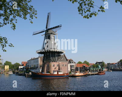 De Adriaan windmill in Haarlem, The Netherlands. Rebuilt in 2002. The original windmill dates from 1779. Seen from Spaarne River Stock Photo