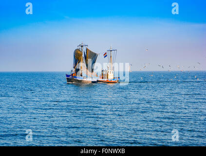 Fishing Trawler cruising in open waters, Lelystad, Netherlands Stock Photo