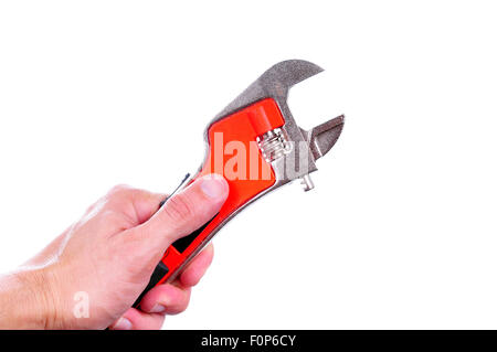 Hand holding an adjustable wrench isolated on white Stock Photo