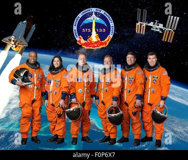 Group portrait of the STS-133 space shuttle crew astronauts in launch-and-entry suits (L to R) Alvin Drew, Nicole Stott, teve Lindsey, Eric Boe, Michael Barratt and Steve Bowen at the Kennedy Space Center February 23, 2011 in Cape Canaveral, Florida. Stock Photo