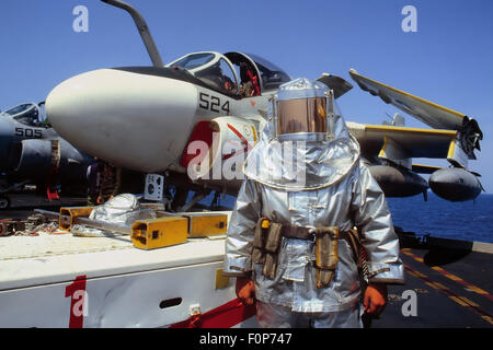 US Navy,  an A 6 'Intruder' strike aircraft and fire prevention service on Nimitz aircraft carrier Stock Photo