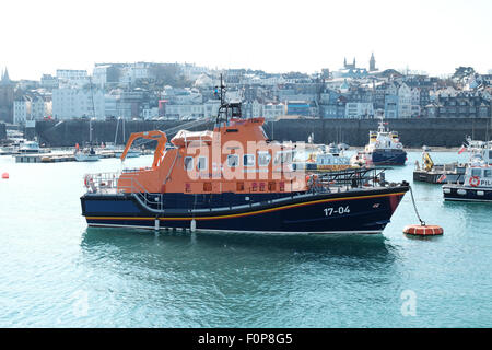 The Spirit of Guernsey Lifeboat in the harbour at St Peter port Guernsey Stock Photo