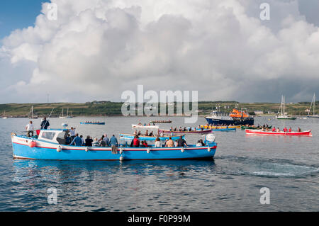 The start of a pilot gig race from Hugh Town, St Mary's to Tresco in beautiful eveniong light. Stock Photo