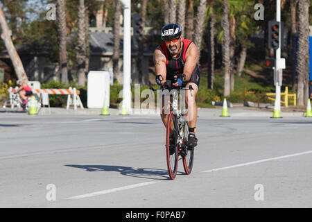 Male Cyclist Competing In The Long Beach Triathlon. 16 August 2015. Stock Photo